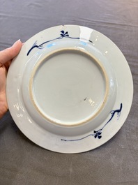 12 Chinese blue and white plates with figural and floral design, 18th C.
