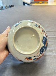 Seven Chinese Imari-style and famille rose bowls with floral and figural designs, 18th C.