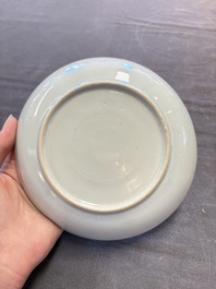 12 Chinese blue and white plates with figural and floral design, 18th C.