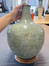 A Chinese celadon-glazed 'lotus scroll' globular vase mounted as lamp, 19th C.