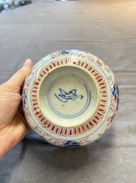 Seven Chinese Imari-style and famille rose bowls with floral and figural designs, 18th C.