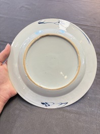 12 Chinese blue and white plates with figural and floral design, 18th C.