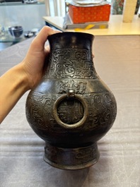 A Chinese archaistic bronze 'hu' vase with chilong design, Song/Yuan