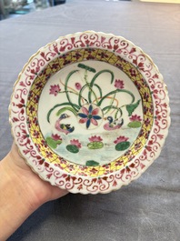 A pair of Chinese famille rose 'mandarin ducks in a lotus pond' Bencharong  tazzas for the Thai market, 19th C.