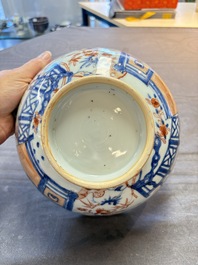 Seven Chinese Imari-style and famille rose bowls with floral and figural designs, 18th C.
