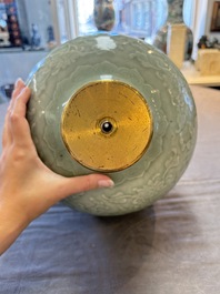 A Chinese celadon-glazed 'lotus scroll' globular vase mounted as lamp, 19th C.