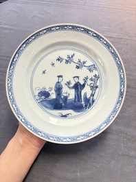 12 Chinese blue and white plates with figural and floral design, 18th C.