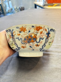 Seven Chinese Imari-style and famille rose bowls with floral and figural designs, 18th C.