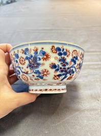 Seven Chinese Imari-style and famille rose bowls with floral and figural designs, 18th C.