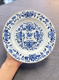 12 Chinese blue and white plates with figural and floral design, 18th C.