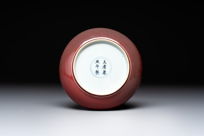 A Chinese copper-red-glazed plate, a meiping vase and two water pots, Kangxi marks, 19/20th C.