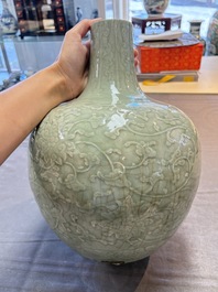 A Chinese celadon-glazed 'lotus scroll' globular vase mounted as lamp, 19th C.