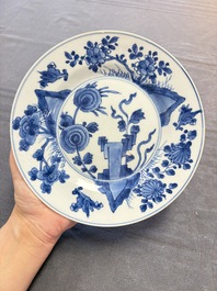 12 Chinese blue and white plates with figural and floral design, 18th C.