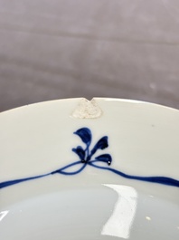 12 Chinese blue and white plates with figural and floral design, 18th C.