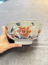Seven Chinese Imari-style and famille rose bowls with floral and figural designs, 18th C.