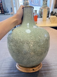 A Chinese celadon-glazed 'lotus scroll' globular vase mounted as lamp, 19th C.