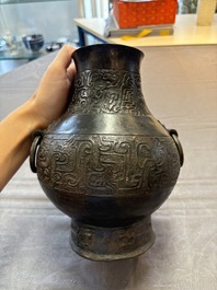 A Chinese archaistic bronze 'hu' vase with chilong design, Song/Yuan