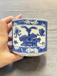Two Chinese blue and white vases, a covered jar and a brush pot, Kangxi and later