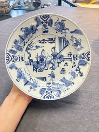 12 Chinese blue and white plates with figural and floral design, 18th C.