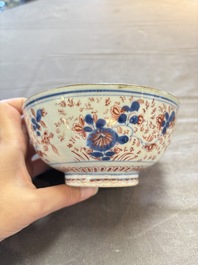 Seven Chinese Imari-style and famille rose bowls with floral and figural designs, 18th C.