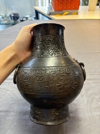 A Chinese archaistic bronze 'hu' vase with chilong design, Song/Yuan
