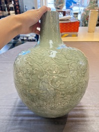 A Chinese celadon-glazed 'lotus scroll' globular vase mounted as lamp, 19th C.