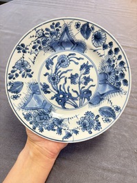 12 Chinese blue and white plates with figural and floral design, 18th C.