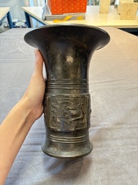 A Chinese archaistic bronze 'zun' vase, Ming