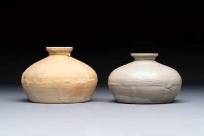 Three cream-glazed bottle vases and two jarlets from the Jepara shipwreck, Dehua or Anxi kilns, Song
