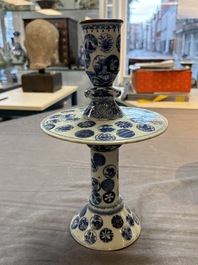 A pair of Chinese blue and white two-piece candle stick holders with brocade ball design for the Southeast Asian market, 19th C.