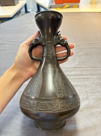 A Chinese archaistic bronze vase with dragon-form handles, Yuan/Ming