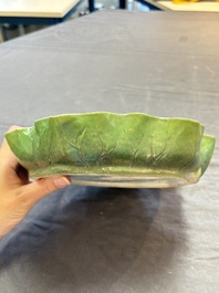 A Chinese green-enamelled lotus leaf-shaped brush washer and a Dehua blanc de Chine Milefo Buddha, 19th C