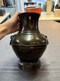 A fine Chinese archaistic bronze 'hu' vase, Song/Yuan