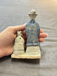 Nine Chinese blue, white, celadon-glazed and famille rose figures, 18/19th C.