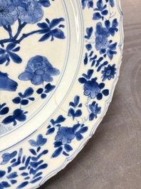 A Chinese blue and white dish with floral design, Kangxi mark and of the period