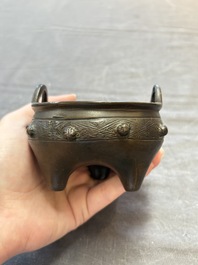 A Chinese archaistic bronze vase and a tripod censer, Yuan
