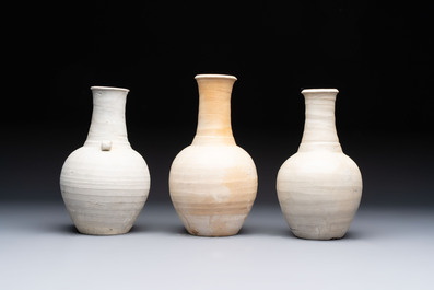 Three cream-glazed bottle vases and two jarlets from the Jepara shipwreck, Dehua or Anxi kilns, Song