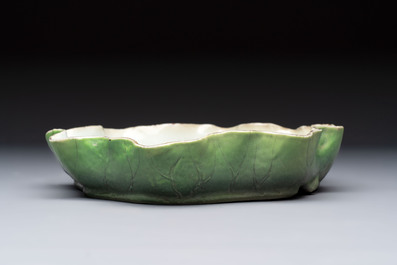 A Chinese green-enamelled lotus leaf-shaped brush washer and a Dehua blanc de Chine Milefo Buddha, 19th C