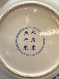 A Chinese blue and white dish with floral design, Kangxi mark and of the period