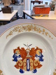 A pair of Chinese armorial dishes with the arms of Valckenier of Amsterdam for the Dutch market, Yongzheng