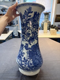 A Chinese blue and white vase with birds among flowering branches, Kangxi