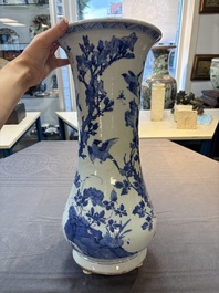A Chinese blue and white vase with birds among flowering branches, Kangxi