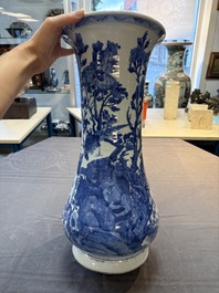 A Chinese blue and white vase with birds among flowering branches, Kangxi