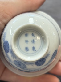A Chinese blue and white 'mandarin duck and lotus' cup, Kangxi mark, 19th C.