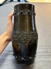 A Chinese archaistic bronze vase and a tripod censer, Yuan