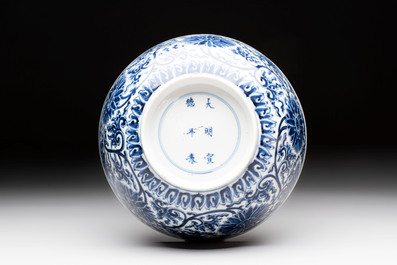 A Chinese blue and white 'lotus scroll' bowl, Xuande mark, Kangxi