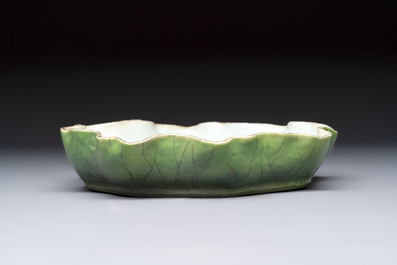 A Chinese green-enamelled lotus leaf-shaped brush washer and a Dehua blanc de Chine Milefo Buddha, 19th C