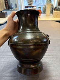 A fine Chinese archaistic bronze 'hu' vase, Song/Yuan
