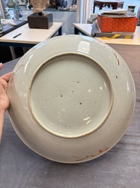 Three Chinese famille rose dishes, two plates and a saucer, various marks, 19th C.