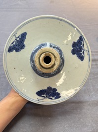 A pair of Chinese blue and white two-piece candle stick holders with brocade ball design for the Southeast Asian market, 19th C.